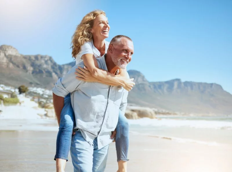 Happy active couple enjoying the outdoors
